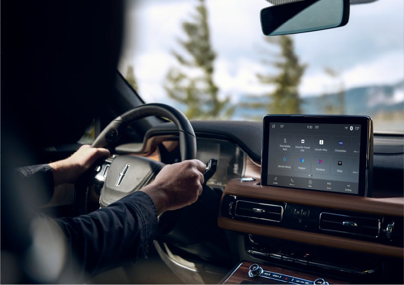 The Lincoln+Alexa app screen is displayed in the center screen of a 2023 Lincoln Aviator® Grand Touring SUV | West Point Lincoln in Houston TX