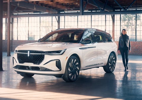 A person approaches a 2024 Lincoln Nautilus® SUV. | West Point Lincoln in Houston TX