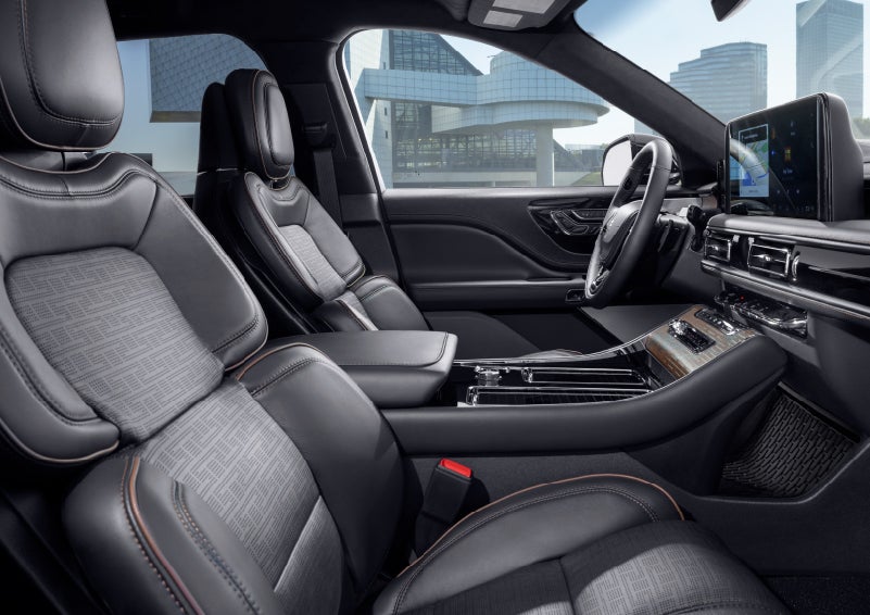 The interior of the 2025 Lincoln Aviator® SUV is shown with sleek black accents. | West Point Lincoln in Houston TX