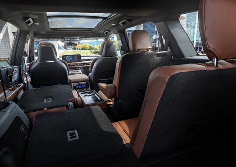 The interior of the 2025 Lincoln Aviator® SUV is shown with two seats folded down for added space. | West Point Lincoln in Houston TX