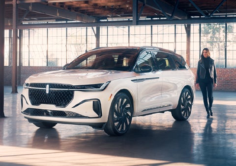 A person approaches a 2025 Lincoln Nautilus® SUV. | West Point Lincoln in Houston TX