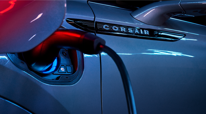 A charger plugged into the charging port of a 2025 Lincoln Corsair® Plug-in Hybrid model. | West Point Lincoln in Houston TX