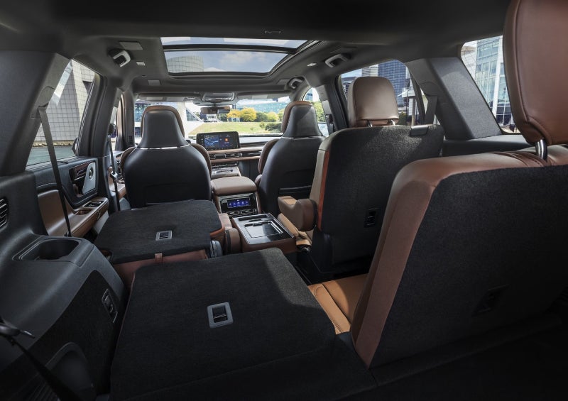 One side of the PowerFold® third-row seat and a second-row seat are folded forward in the 2026 Lincoln Aviator® SUV. | West Point Lincoln in Houston TX