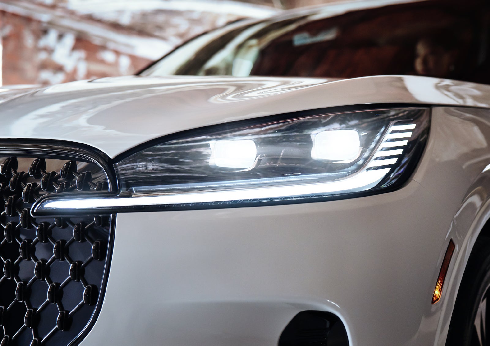 A close-up of a headlamp on the 2027 Lincoln Aviator® SUV is shown. | West Point Lincoln in Houston TX