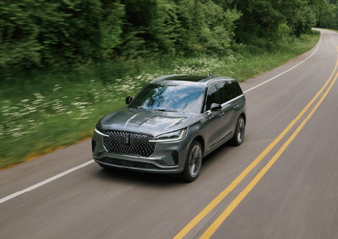 A 2027 Lincoln Aviator® SUV is being driven down a road. | West Point Lincoln in Houston TX