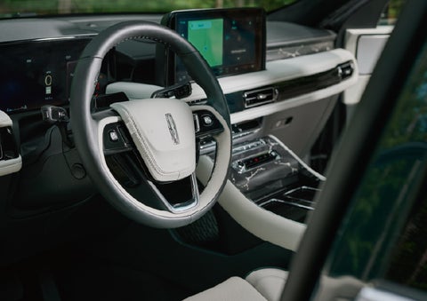 The leather-trimmed steering wheel of a 2027 Lincoln Aviator® Black Label™ SUV. | West Point Lincoln in Houston TX